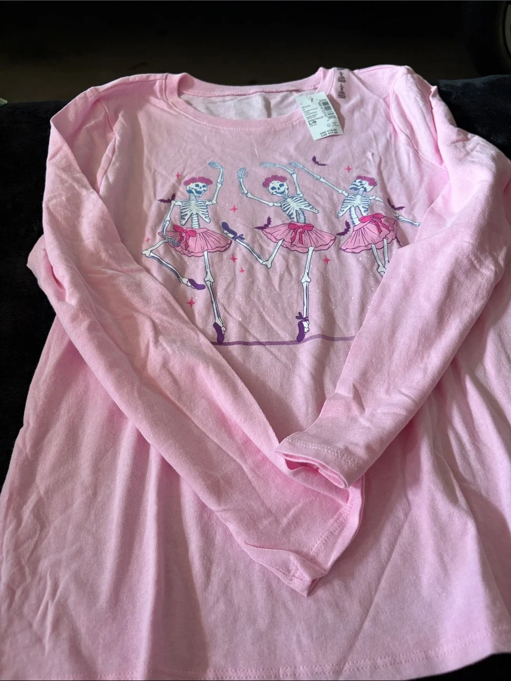 Pink skeleton graph shirt size 10-12